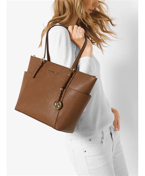 michael michael kors jet set top zip east-west tot|Michael Kors carryall.